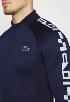 Lacoste Sport Tennis Jacket - Trainingsvest - Navy Blue -Lyno Kleding Winkel 600bd54283e643dfa44a785d2187b1f2