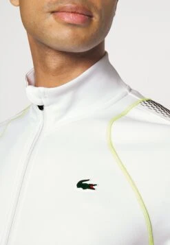Lacoste Sport Tennis Jacket Med - Trainingsvest - Blanc Jaune -Lyno Kleding Winkel 624c4eb3980949f2a252ed4de6c319a8