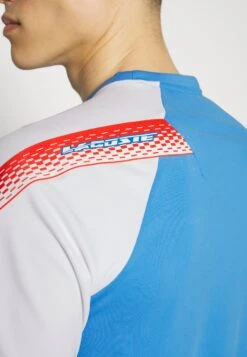 Lacoste Sport Tennis - Sport T-Shirt - Bleu/Blanc -Lyno Kleding Winkel 6f567707c8694451b77b44daf9ccfe1b
